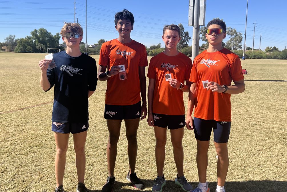 (Left to right) Freshman Noah Brunet (Ironwood Ridge HS), sophomore Louis Madrigal-Diaz (North Canyon HS), sophomore Zack Comaduran (Marana HS) and freshman Tayvien Biancuzzo (Mica Mountain HS) all earned All-Region honors at the Region I, Division I Championships. The Aztecs took third place with a score of 57 team points. Photo by Raymond Suarez